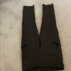 LuluLemon army green athletic leggings.